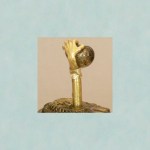 Heart of Darkness snow globe, detail of hand