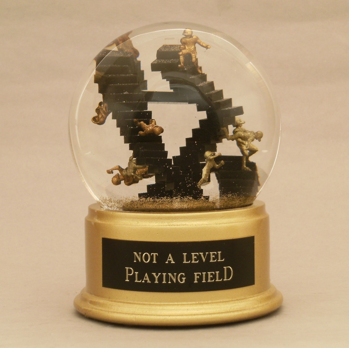 Football Escher snow globe