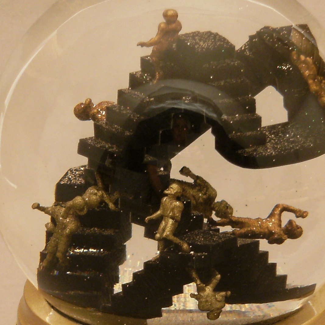 Escher football snow globe