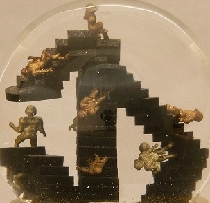 Escher football snow globe