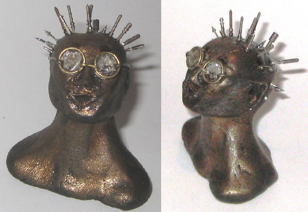 Pinhead, miniature head sculpture in snow globe, Camryn Forrest Designs, Denver Colorado