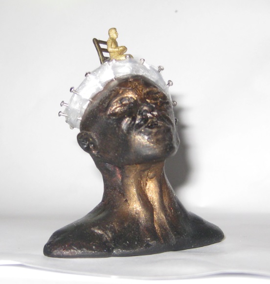 Shrink Wrap miniature head sculpture in snow globe, Camryn Forrest Designs, Denver Colorado