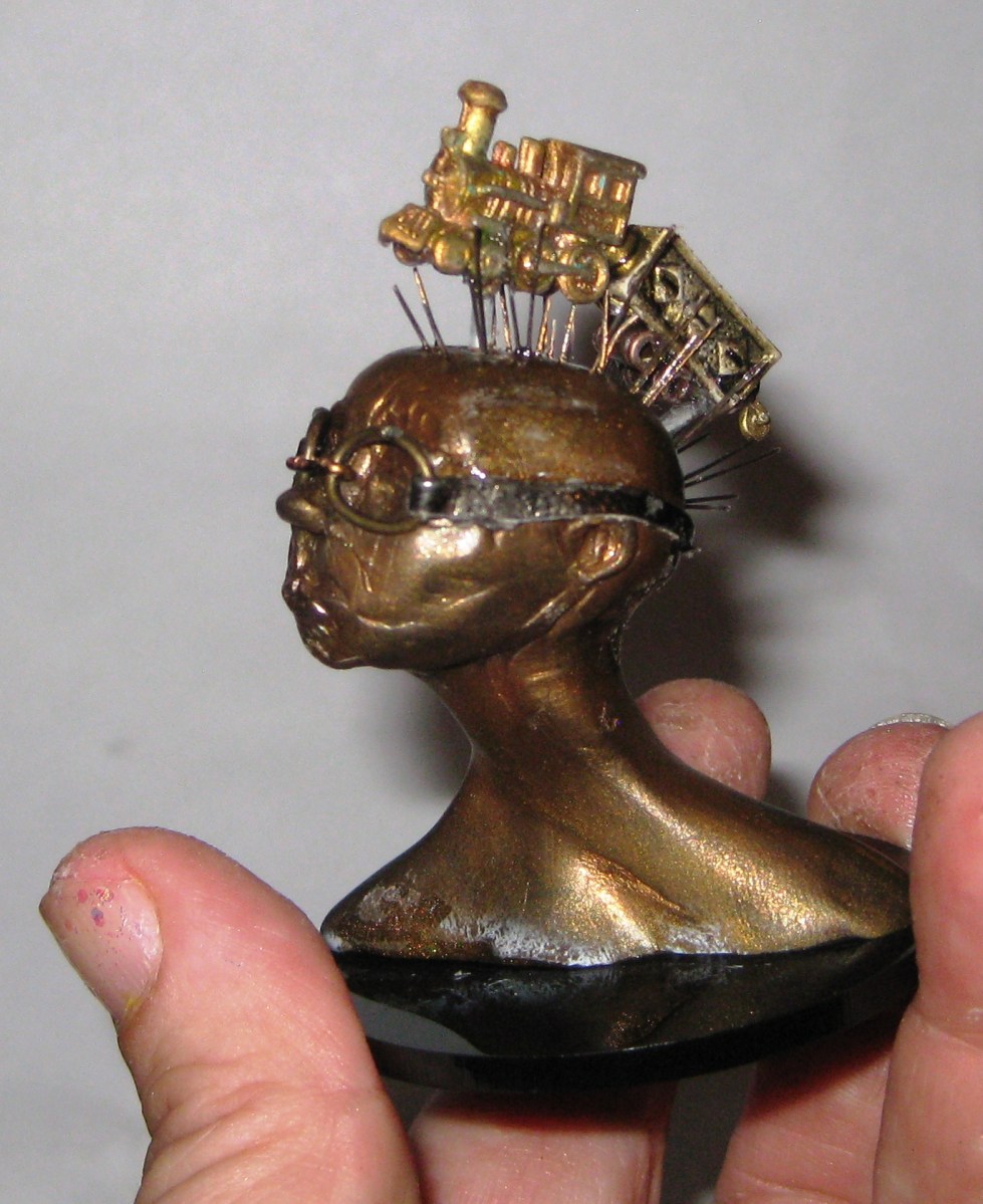 Train of Thought, miniature head sculpture in snow globe, Camryn Forrest Designs, Denver Colorado