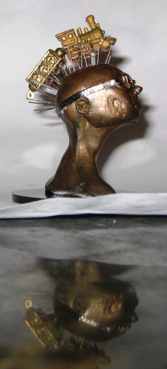 Train of Thought, miniature head sculpture in snow globe, Camryn Forrest Designs, Denver Colorado