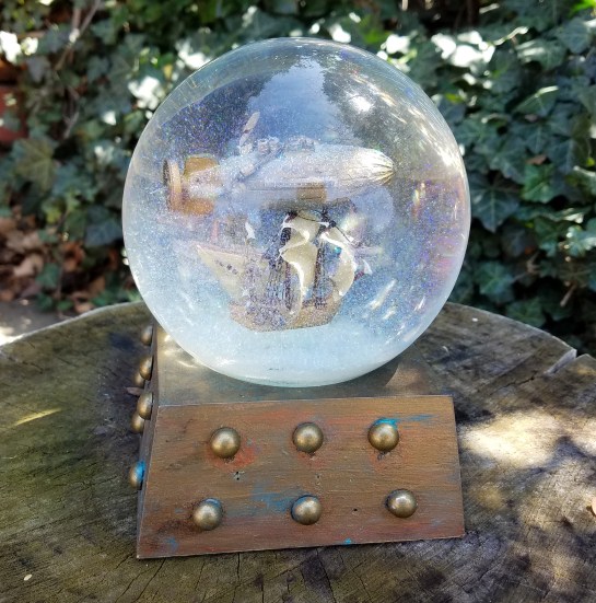 Voyage Beyond airship snow globe, Camryn Forrest Designs, Denver, Colorado